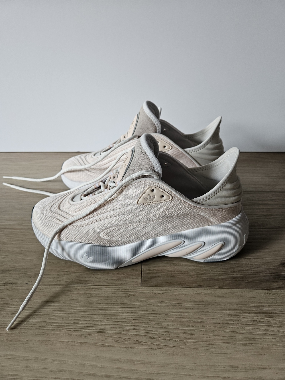 AdiFOM SLTN sneakers in the Wonder Quartz and Halo Blush